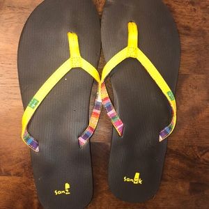 Yellow sanuk flip flop